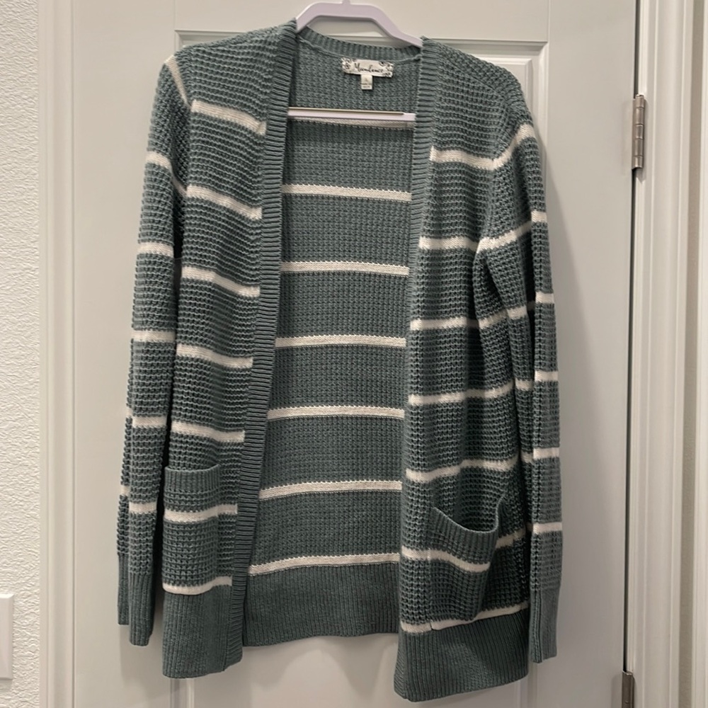 Large light blue and white striped knitted cardigan with pockets